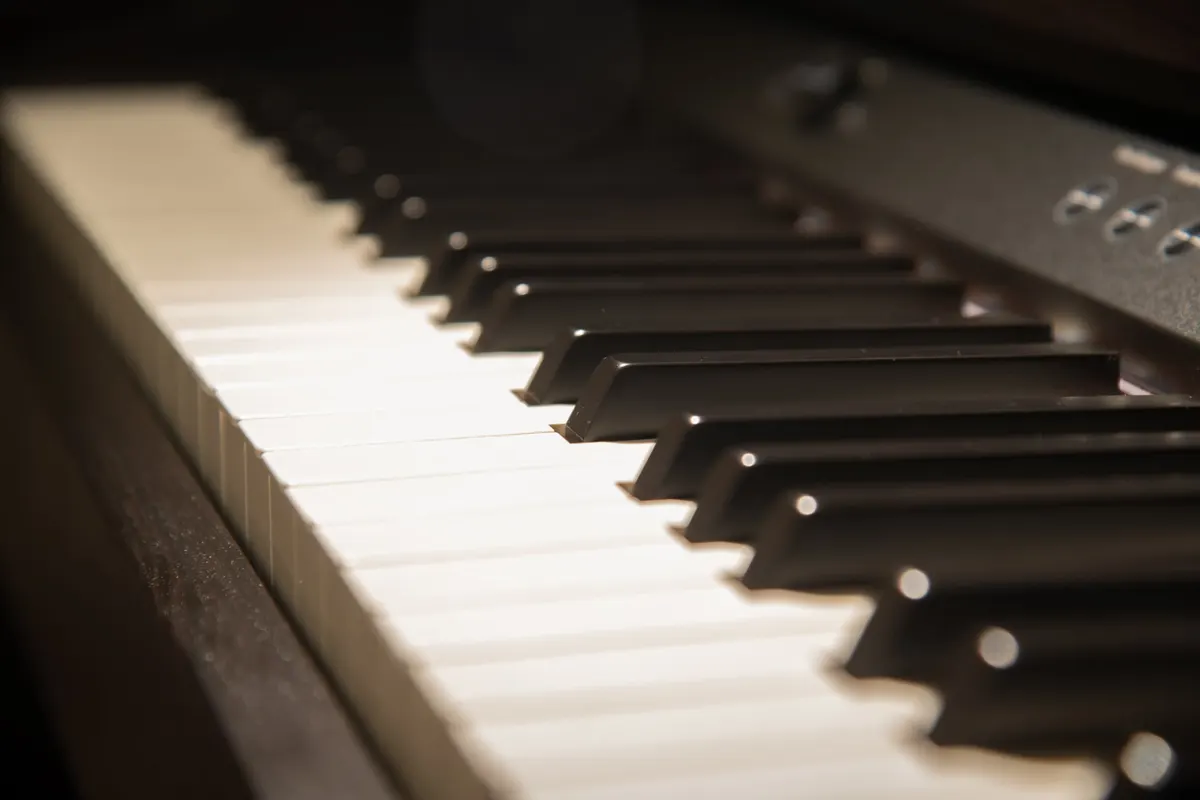Piano keys in warm light